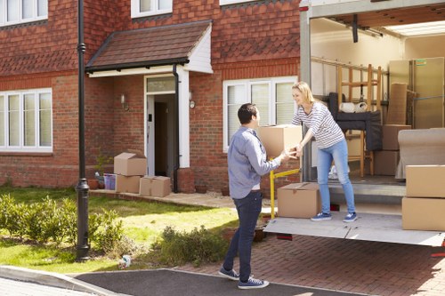 Loading furniture into a van for a Creekmouth move