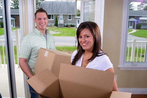 Professional moving team helping with a flat or office move in Creekmouth