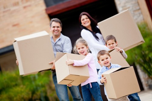 Professional van moving team handling items with care in Creekmouth