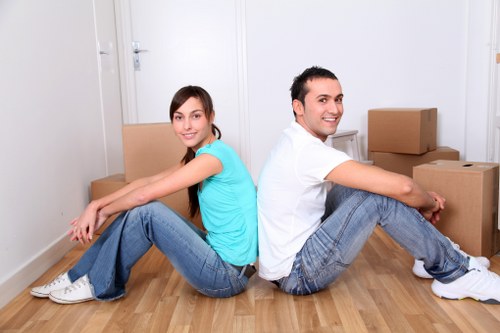 Local team collecting sofas and chairs from a Creekmouth property