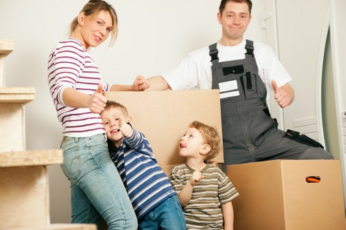 Careful wrapping and labelling of household items during packing in Creekmouth
